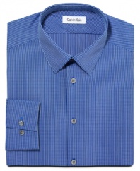 Sleek stripes and a slim fit give this Calvin Klein shirt a streamlined, modern look.