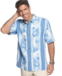 Elevate your casual style with this luxurious silk shirt from Tommy Bahama with a tropical floral print.