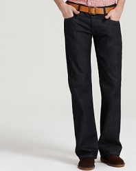 Diesel slim bootcut jeans with five pocket styling and button fly. 12.5 oz denim. In an ultra dark wash, an almost raw look.