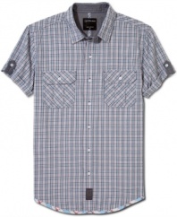 In a cool classic plaid, this Calvin Klein Jeans shirt effortlessly blends into your everyday style.