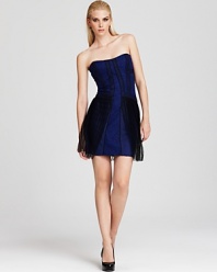 Cut from delicate lace, this revel-ready BCBGMAXAZRIA strapless dress flaunts pleated chiffon panels at the skirt for a cutting-edge silhouette.