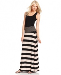 Wide and slim stripes pair up to give a slinky, super-soft maxi skirt from Calvin Klein a contemporary feel. It's perfect for adding a chic graphic element to your essential basics.