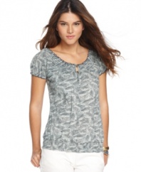 This easy printed top from Lucky Brand Jeans features a smocked scoop neckline you can wear off the shoulders as the weather warms. The feather print is so boho-chic, too!