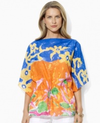 Embodying the breezy style of the tropics in a bright and bold batik print, this airy cotton top speaks volumes in a beautifully draped silhouette, from Lauren by Ralph Lauren.