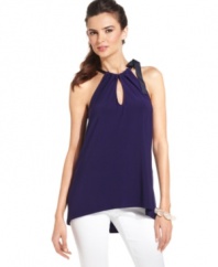 A sultry keyhole neckline and charming ribbon ties add a flirty touch to this slinky sleeveless top from T Tahari. Keep it casual yet sexy by adding a pair of crisp white jeans and stand-out jewelry.