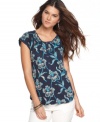 A simple tee is made girly with an artistic floral print and delicate henley placket, from Lucky Brand Jeans.