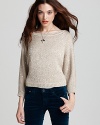 Sequins adorn this slouchy-chic Splendid sweater, for low-key luxe. The relaxed silhouette strikes the perfect balance with your favorite skinnies.