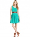 Outfitted in a fresh color and accessorized with a matching belt, Calvin Klein's dress is full of spring appeal.