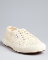 In ladylike crochet, Superga's classic lace-ups lend a timeless look.