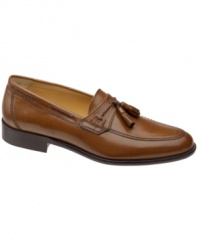 Dress to impress in this pair of men's dress shoes. These smooth tassel loafers for men put the polish back into your work week wardrobe.