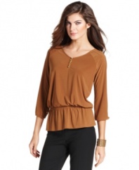 Pep up your look with Ellen Tracy's peasant top, complete with a feminine peplum and goldtone buttons.