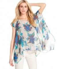 A bold floral print makes this RACHEL Rachel Roy top a stylish pick for a summer look -- perfectly paired with skinny jeans or cutoff shorts!