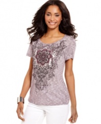 Make any day feel like you're somewhere faraway in this exotic tee, featuring a gorgeous placed print that's embellished with studded detail.