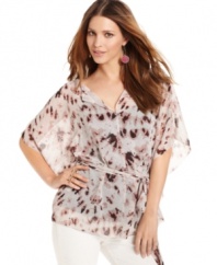 With an allover abstract print, this floaty RACHEL Rachel Roy blouse makes its mark as a fashion-forward topper!