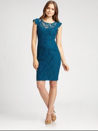 A gorgeous lace dress featuring a feminine neckline, delicate sleeves and a body-conscious fit. This style features removable lining.Round neckCap sleevesElasticized waistConcealed back zipperRemovable liningAbout 23 from natural waist70% cotton/30% nylonDry cleanImported Model shown is 5'10 (177cm) wearing US size 4. OUR FIT MODEL RECOMMENDS ordering true size. 