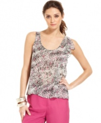 The abstract print and one-sided ruffle adds unexpected edge to this otherwise floaty, femme BCBGeneration tank!
