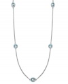 Short and traditional. This luminous strand necklace features round and oval-cut blue topaz (5 ct. t.w.) strung from a delicate sterling silver chain. Approximate length: 17 inches.