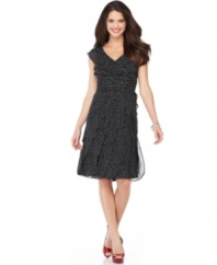 Adrianna Papell's polka dot dress features pleated detail at the bodice and sheer, sweeping tiers through the skirt. Pairs easily with black peeptoe pumps, and can be just as easily played up with red or yellow heels!