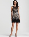 Get noticed in this decadent beaded dress from Sue Wong, accented with airy feathers at the hem.