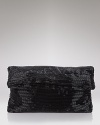 Finish your evening look with this beaded fold-over clutch from Le Regale.