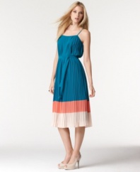 Go for retro styling with this colorblocked MM Couture pleated dress in a midi length that's oh-so seventies!