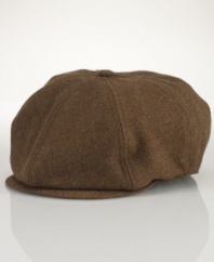 A classic vintage-inspired newsboy cap is rendered in soft tweed, adding a dose of heritage style to any ensemble.