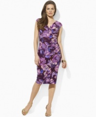 Crafted with a stunning V-neckline and flattering ruched detailing, Lauren by Ralph Lauren's chic floral dress is the epitome of elegance and effortless style in fluid, body-skimming matte jersey.