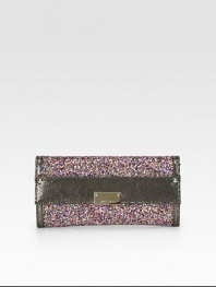 This multicolor glitter style is accented with a glossy textured leather trim.Magnetic snap flap closureOne inside zip pocketTwelve credit card slotsTwo bill compartmentsLeather lining9½W X 4¾H X 1DMade in Italy