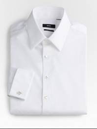 A formal style woven with a subtle diamond texture in crisp cotton. Buttonfront Modified point collar Bluff edge French cuffs Cotton; dry clean Imported 
