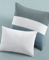 Clean lines and a soft texture make this quilted decorative pillow irresistible.