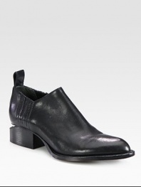 An oxford-inspired leather silhouette with elastic side gores and modern cut-out stacked heel. Stacked heel, 1¼ (30mm)Leather upper with elastic goresLeather pull-tabLeather lining and solePadded insoleImported