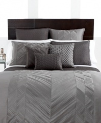 A central zigzag motif of silvery pleats collect down the center of this Pieced Pintuck European sham, offering versatile texture that redirects light in waves. Coordinate this sophisticated design with Pieced Pintuck gray accents to vivify the look of your bedroom. (Clearance)
