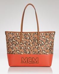 Give your look an punch of print with this tote from MCM. Made from coated canvas and splashed with spots, it boasts a look that's ready for work or play.