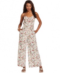 An allover abstract print adds a modern edge to this BCBGeneration wide-leg jumpsuit, perfect for chic day-to-night style!