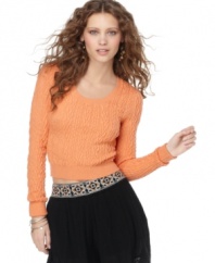Cable knit gets modernized in a cool-girl cropped style with this Free People top -- a perfect spring staple!