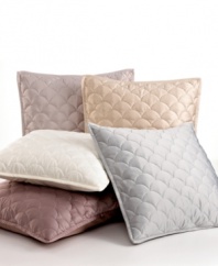 The Crescent Moon decorative pillow from Barbara Barry provides an extra layer of dimension on your bed with an understated, elegant appearance.