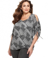 Show off a hint of skin with Style&co.'s cold-shoulder plus size top, featuring a vivid print.