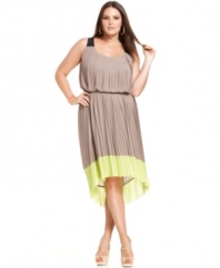 Jessica Simpson's plus size dress is both ladylike and electrifying--a sweet pleated silhouette is amplified with  bright contrasting colorblocking and a high-low cut at the hem.