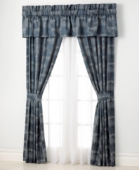 An ombre dye pattern of deep blue and white creates a soft, misty design upon this Indigo Ombre window panel pair from Tommy Bahama. Layer with its coordinating valance for the perfect sea-inspired bedding backdrop. Includes tiebacks.