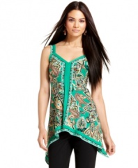An asymmetrical hem and a bold, exotic print spice up INC's unique tunic tank! Try it with leggings or capris for a fresh look.