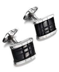 Sleek & refined. These rectangular-shaped cuff links make the favorite accent to his best work shirt. Crafted in sterling silver, an engraved onyx stone decorates the center (10-3/4 ct. t.w.). Approximate length: 13/16 inch. Approximate width: 5/8 inch.