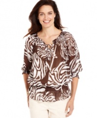 Jones New York Signature's printed peasant top is a classic for day or night. The sheer printed fabric gives it a touch of sophistication, while the easy silhouette is essential for the season.