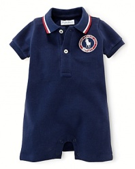 This preppy short-sleeved polo shortall in breathable stretch cotton mesh celebrates Team USA's participation in the 2012 Olympics with USA patching.