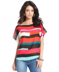 Go for statement shades with this bold, graphic-print GUESS? blouse -- perfect over white denim for summer!
