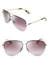 These RALPH Ralph Lauren Top Bar aviator sunnies get top marks for their colorful point-of-view, with eye-catching, watercolor-effect arms.