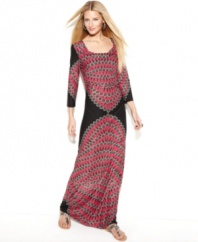 Get the global-glam look with INC's stunning maxi dress! The draped neckline adds allure to this subtle style.