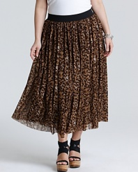 Petal-soft pleats lend movement to a vibrant animal-print for a VINCE CAMUTO PLUS skirt that moves effortlessly through your day.