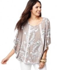 A printed poncho-style top adds relaxed elegance to any outfit! Try Style&co.'s top with your favorite shorts and capris.