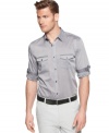 Increase your visibility at the office or on the town with this chambray shirt from Calvin Klein.