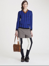 Quintessentially Marni, this vibrantly intarsia-knit style features a sporty, contrasting striped neckline.Constrast V necklineRib-knit cuffs and hemPatch pockets70% polyamide/30% woolDry cleanMade in Italy of imported fabricModel shown is 5'11 (180cm) wearing US size 4. 